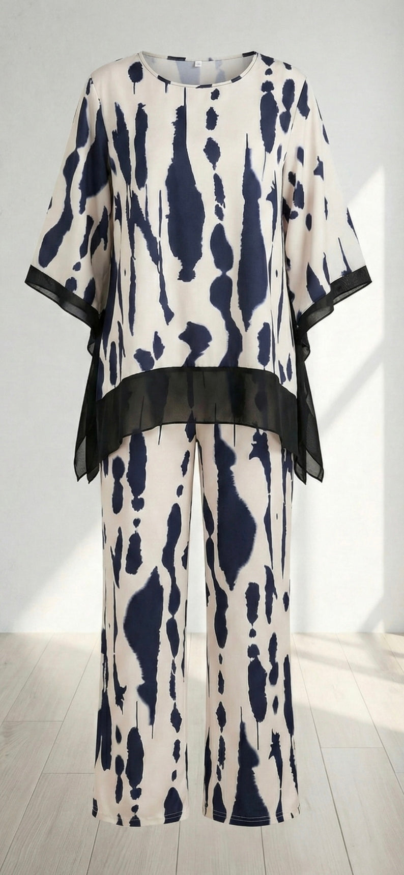 Set Short-sleeves blouse and trousers